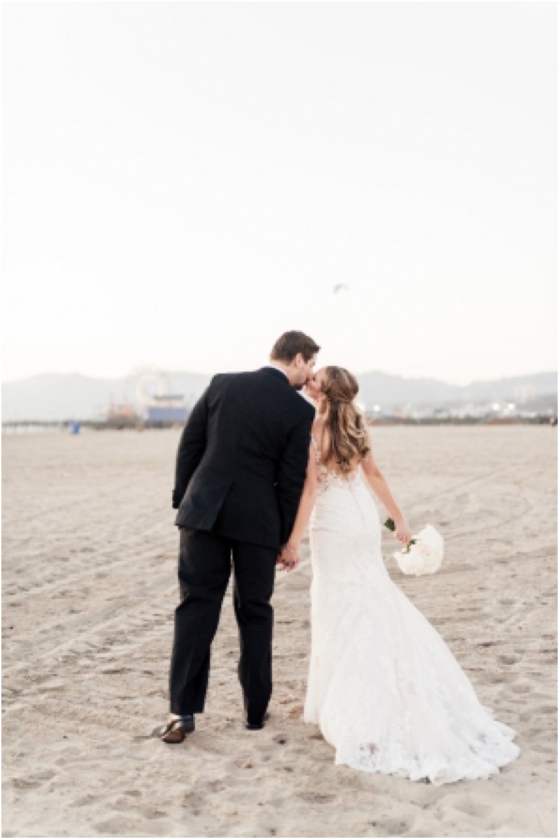  romantic portraits of bride and groom on beach in santa monica 